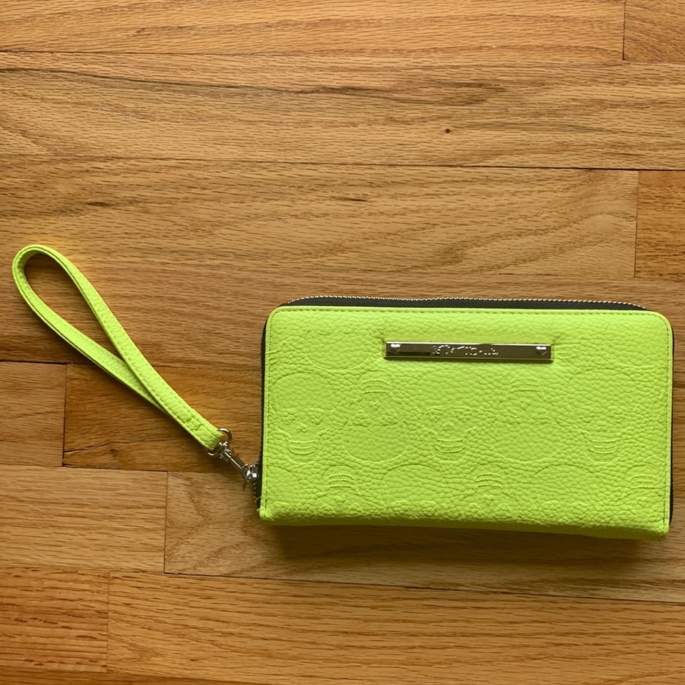 Betsey Johnson lime wristlet clutch with skull print design wallet